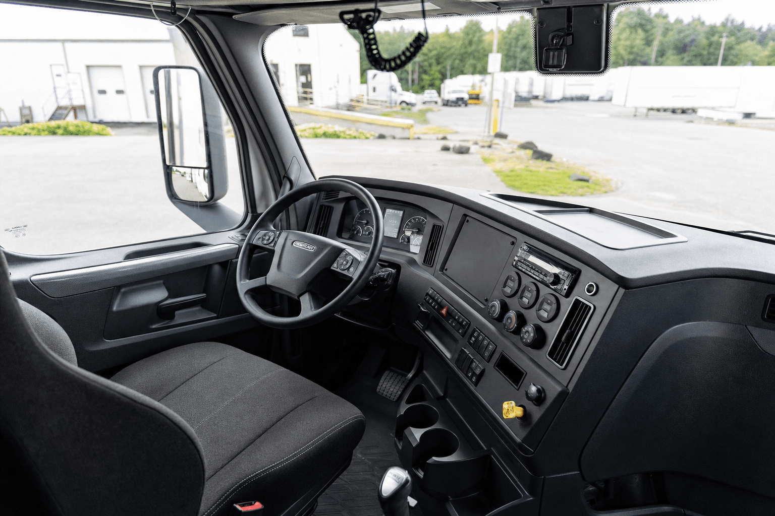 Clean, detailed truck cab with spotless dash and windows
